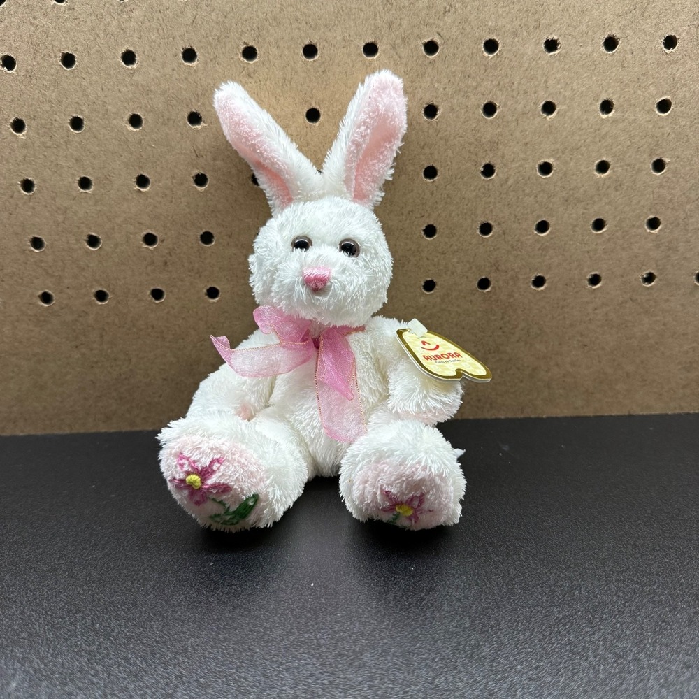 Aurora world inc white rabbit stuffed animal with pink bow and flowers on feet